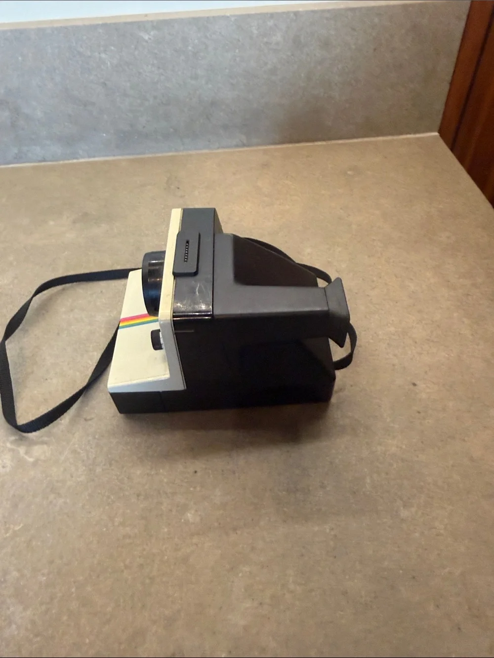 Polaroid White Instant Camera with Rainbow Stripe and Black Accents